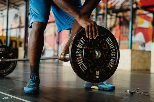 Train veilig en efficiënt met een hoogwaardige 50mm Olympische barbell.