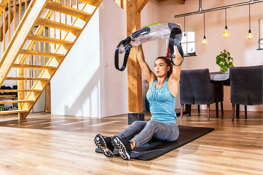 Tunturi aquabag – watergevulde powerbag met vier handgrepen, geschikt voor functionele krachttraining en core stability.